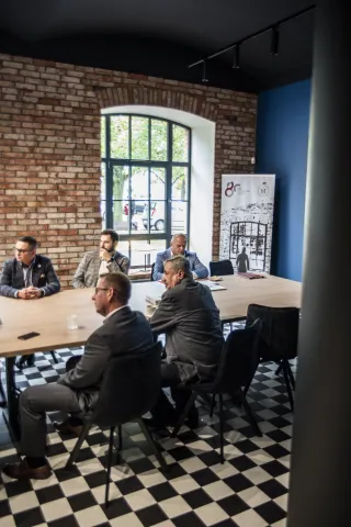 Posiedzenie Członków Rady w sali konferencyjnej